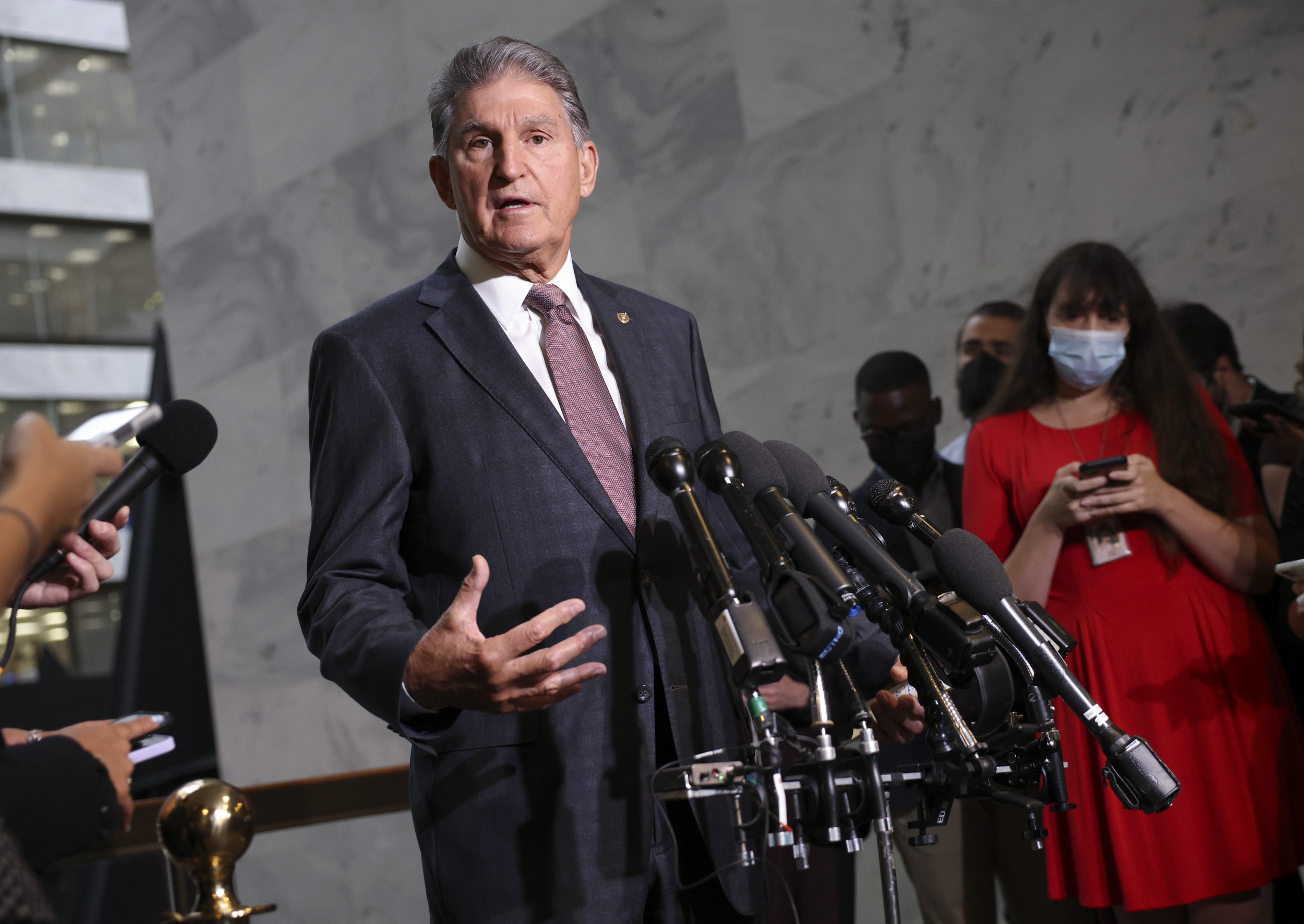 Manchin opposes $150B clean energy program in Biden's spending bill, says not necessary 1 Manchin opposes $150B clean energy program in Biden's spending bill, says not necessary