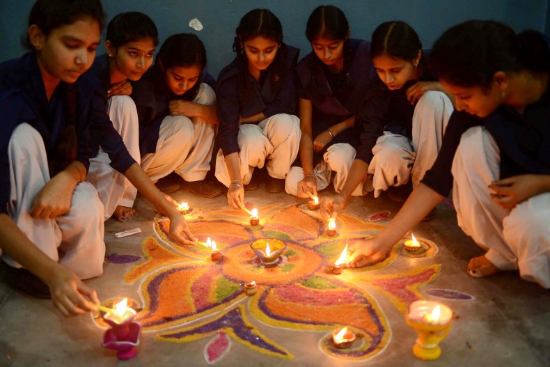 7 Diwali decorations to celebrate the 'Festival of Lights' in style 4 Children prepare a Rangoli during Diwali