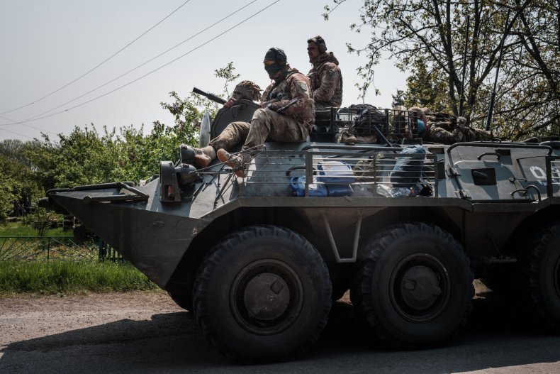 Ukraine soldiers and APC in Donbas Russia