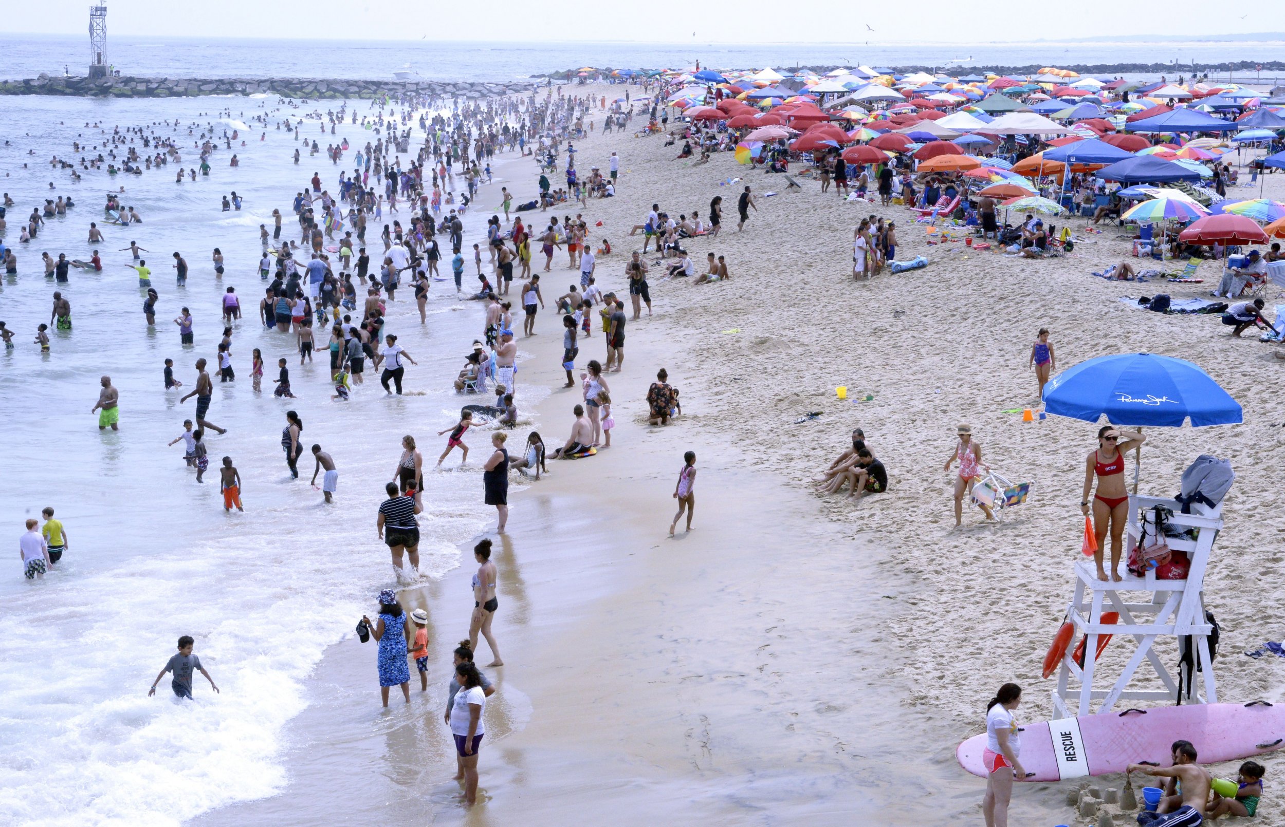 Sunbathers crowd the beach in Ocean City, Maryland, on July 22, 2017. 