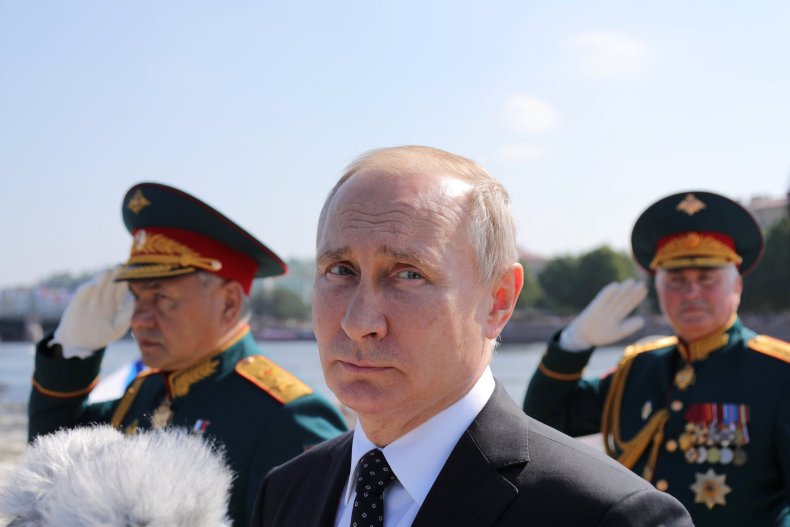 2018-07-29T102513Z_1674241168_RC1250205BF0_RTRMADP_3_RUSSIA-NAVY-DAY-PARADE-PUTIN