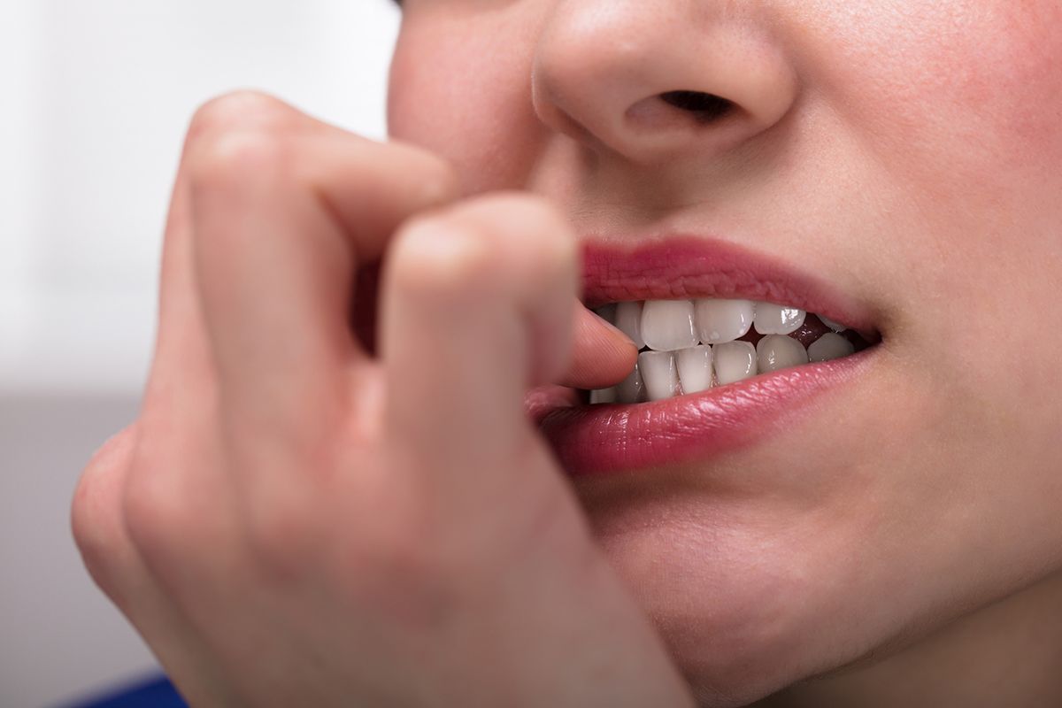 Woman With Nail Biting Habit Has Thumb Amputated After Developing Cancer