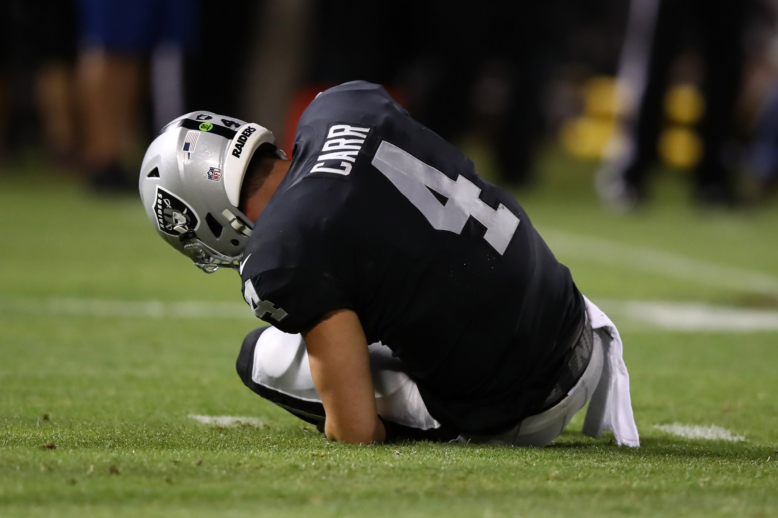 Live coverage: Three Carr interceptions prove Raiders' undoing in