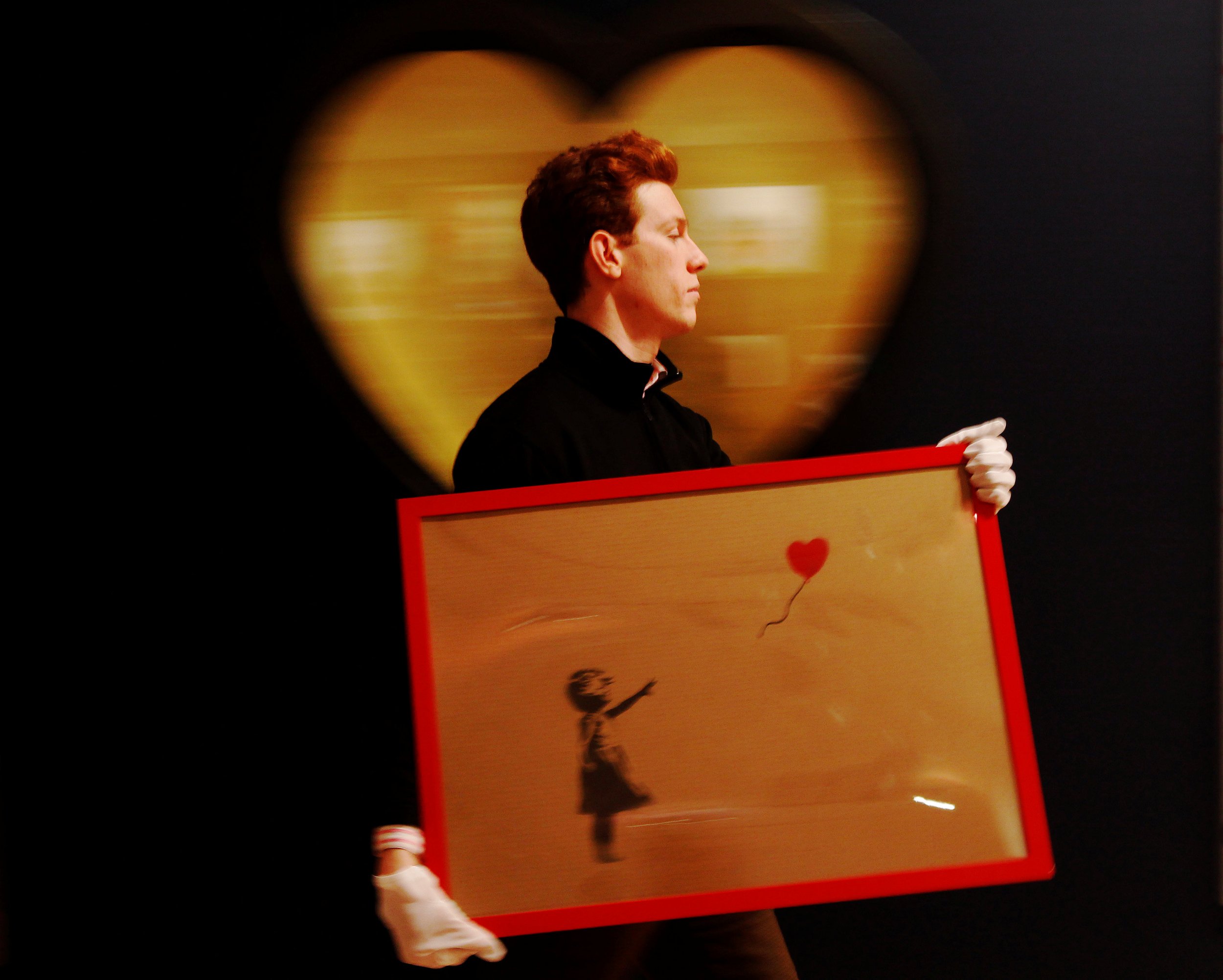 Watch: Banksy Shows How He Fitted A Shredder Into A Frame For Famed Art ...