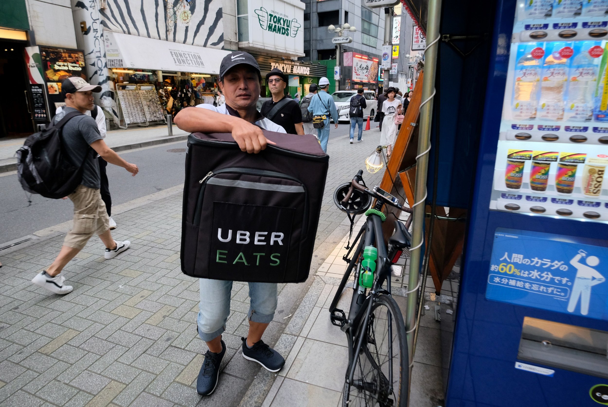 uber eats driver on bike