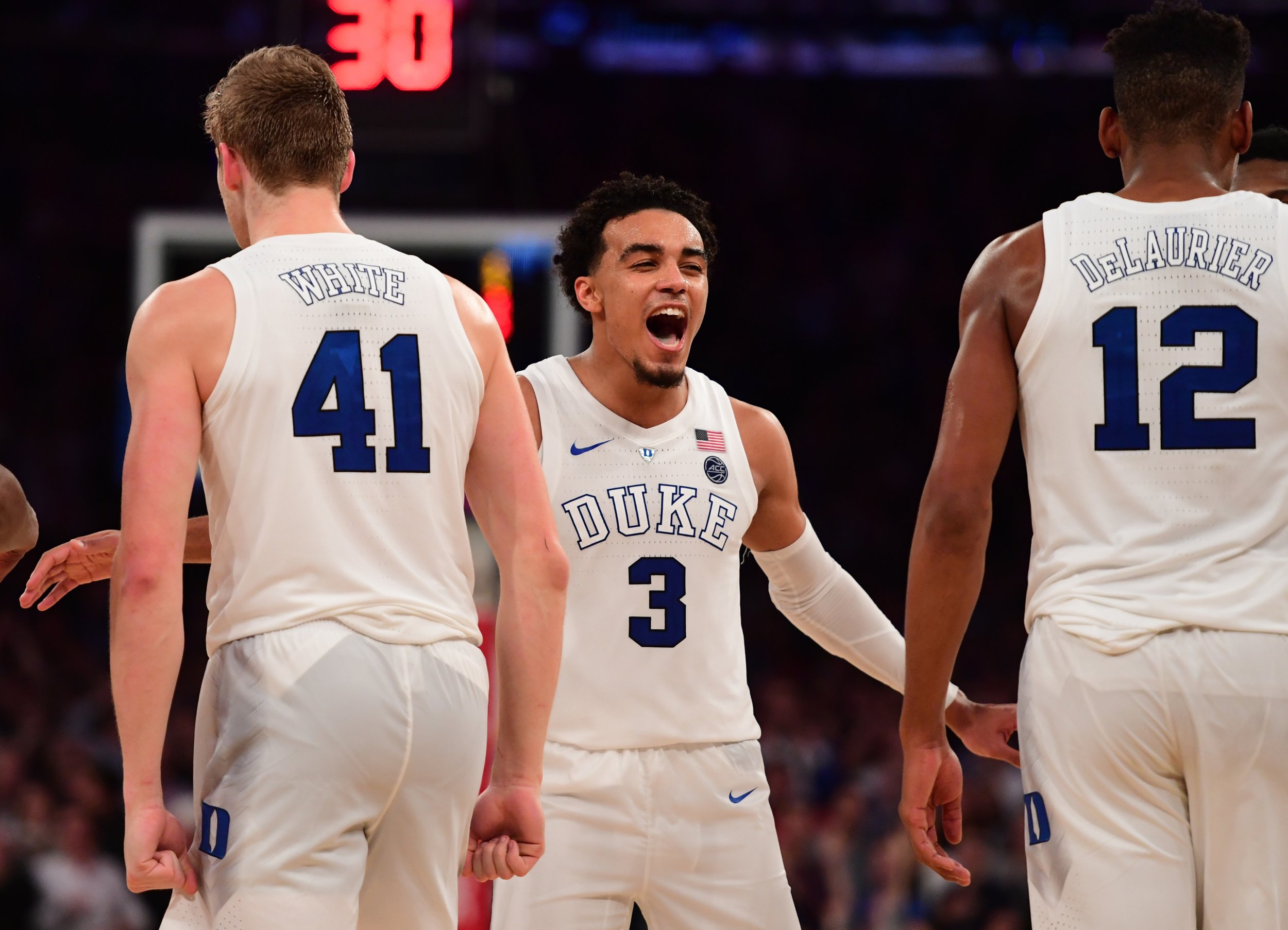 December 18, 2014: Duke Blue Devils guard Tyus Jones (5) calls out the play  during the NCAA basketball game between Connecticut Huskies and the Duke  Blue Devils at the IZod Center in