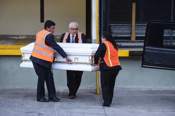 guatemala migrant child coffin carried funeral employees guatemala migrant child coffin carried funeral employees