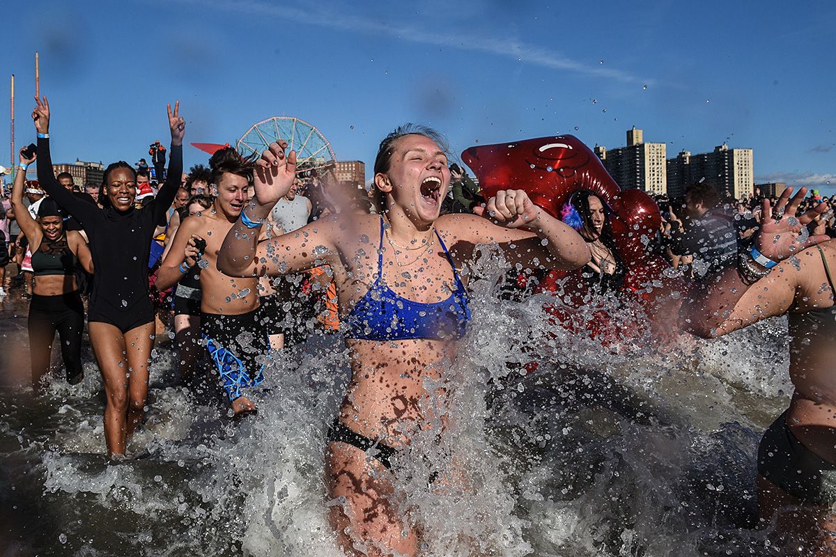 In Pictures: Thousands brave Atlantic on New Year's Day in 115th Coney...