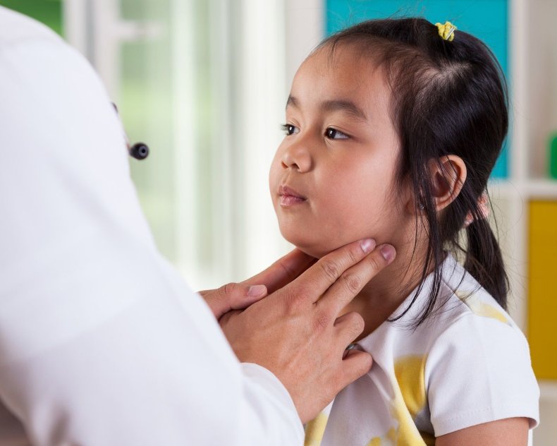 mumps doctor pediatrician child patient stock getty