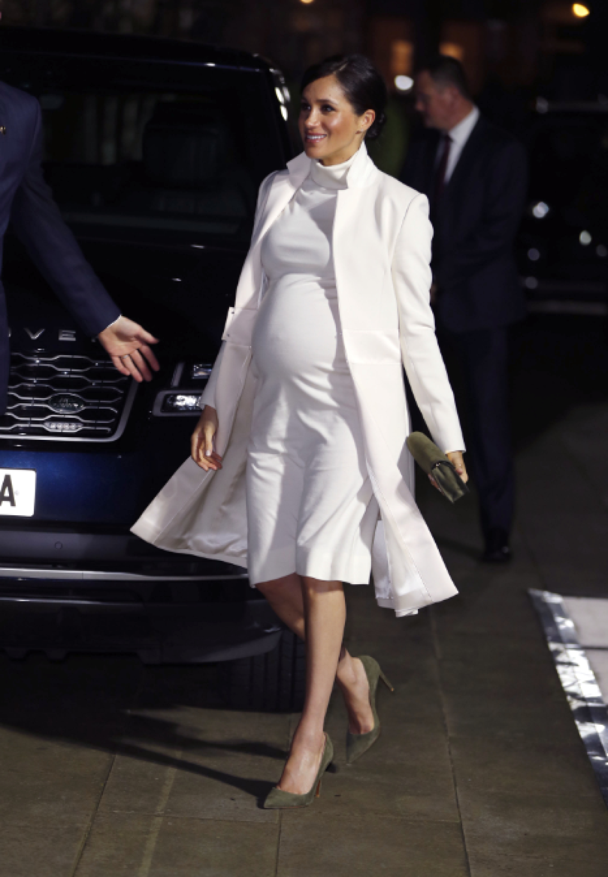 Meghan Markle Shows Off Growing Baby Bump