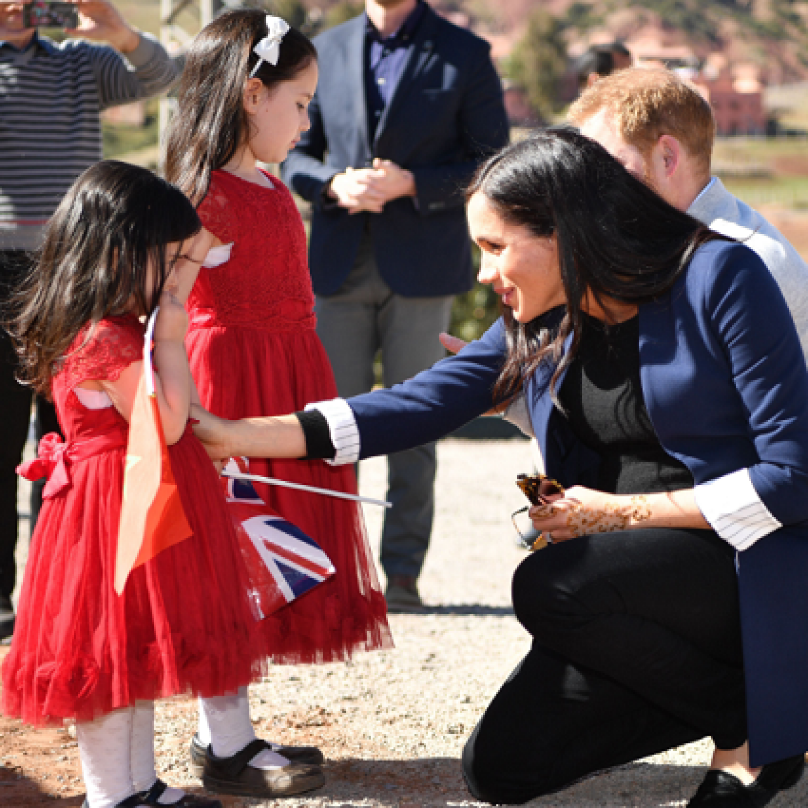 Pictures Of Pregnant Meghan Markle And Prince Harry Greeting Children In Morocco And More Photos Of Couple S Trip