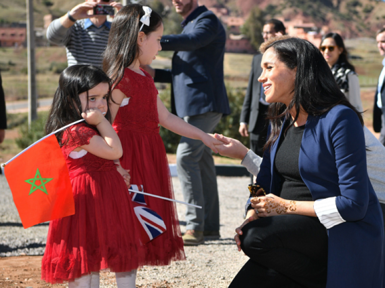 Pictures of Pregnant Meghan Markle and Prince Harry Greeting Children in Morocco and More Photos of Couple's Trip (1341942)