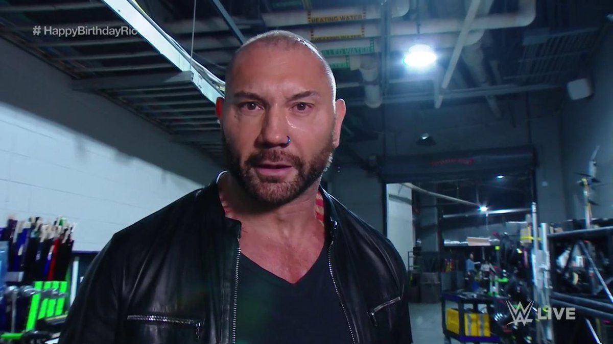 Batista Returns to WWE Monday Night RAW and Calls Out Triple H Newsweek