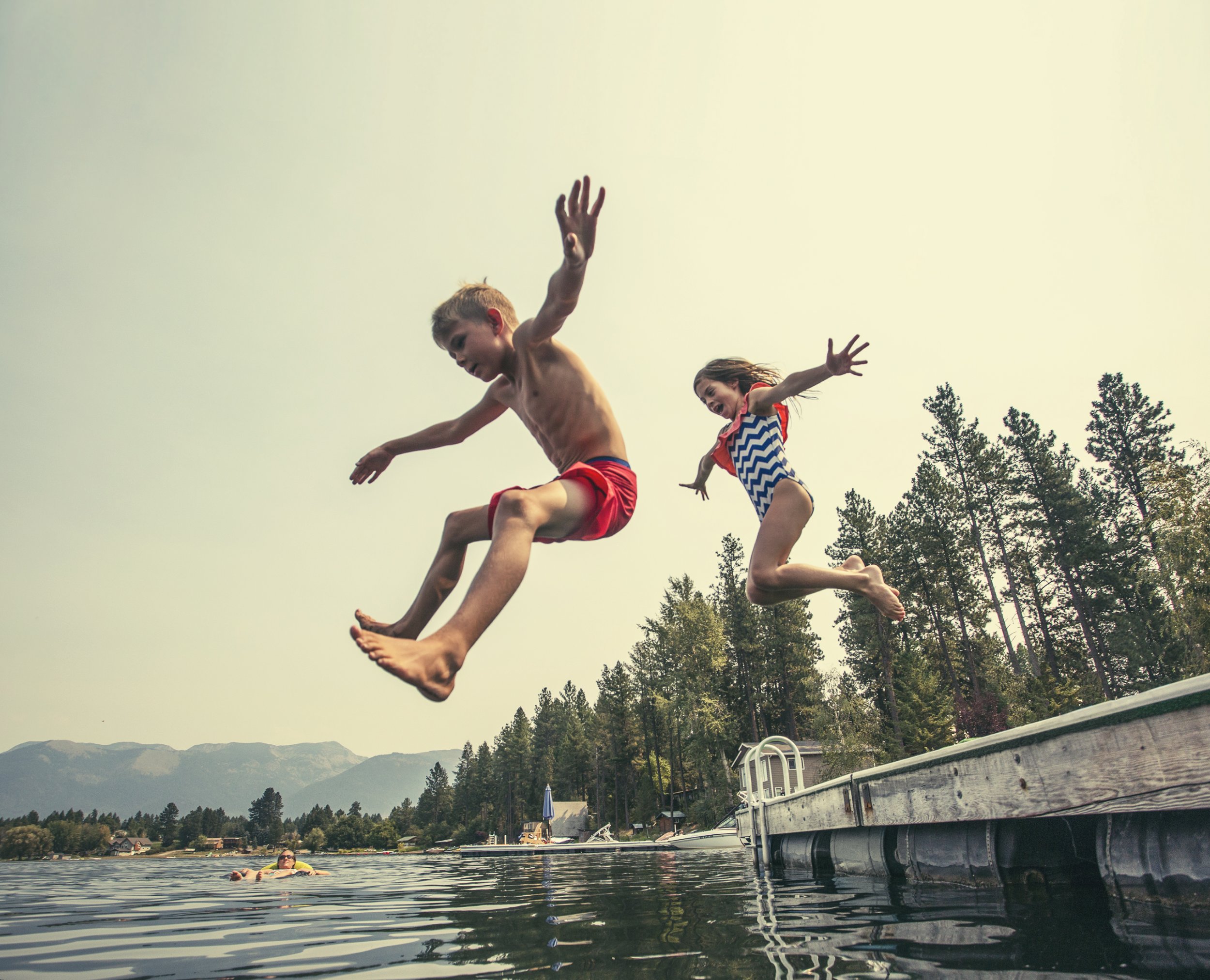 children water swim jump getty stock