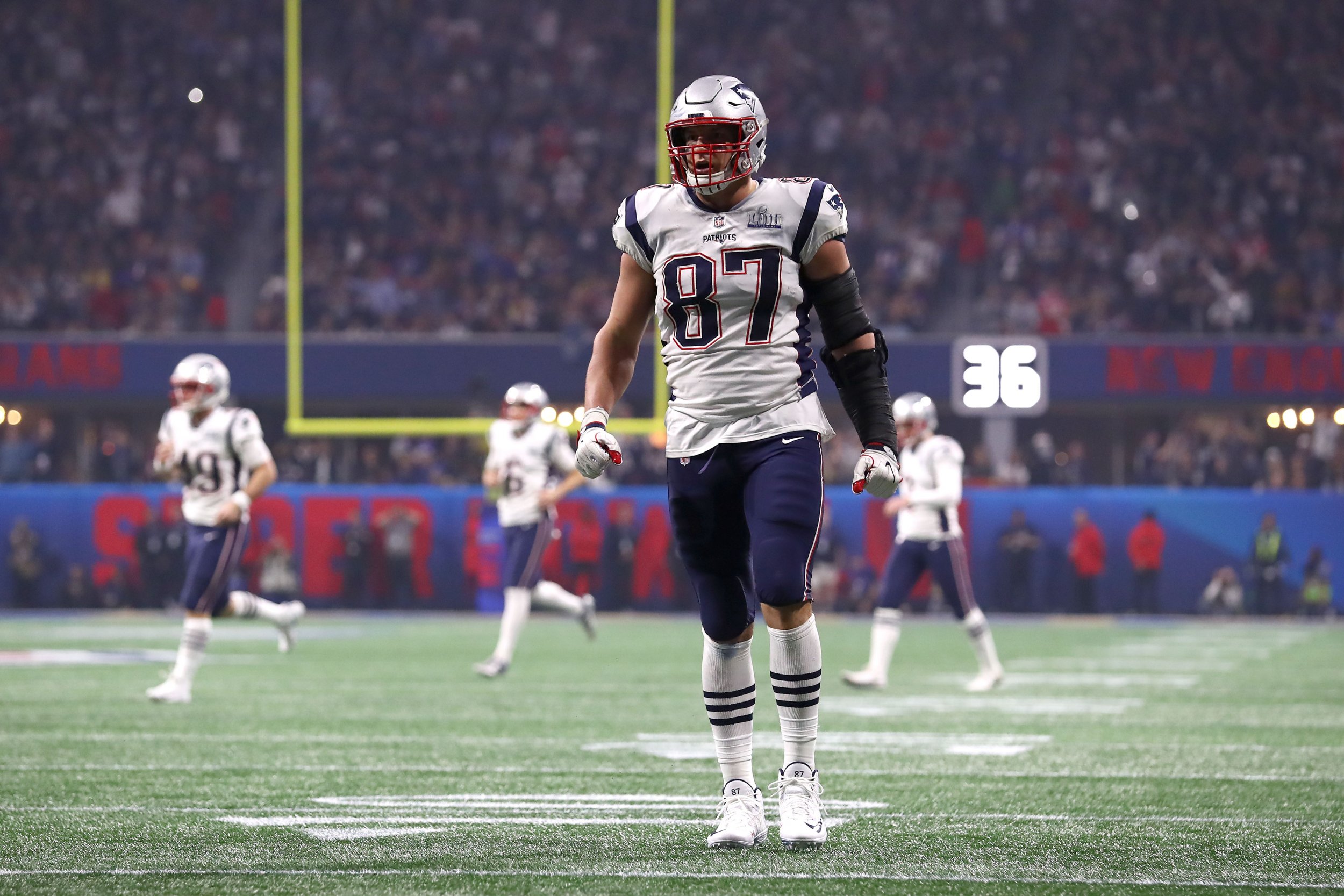 New England Patriots tight end Rob Gronkowski (87) warms up before an NFL  football game between the New England Patriots and the Washington Redskins,  Sunday, Nov. 8, 2015, in Foxborough, Mass. (AP