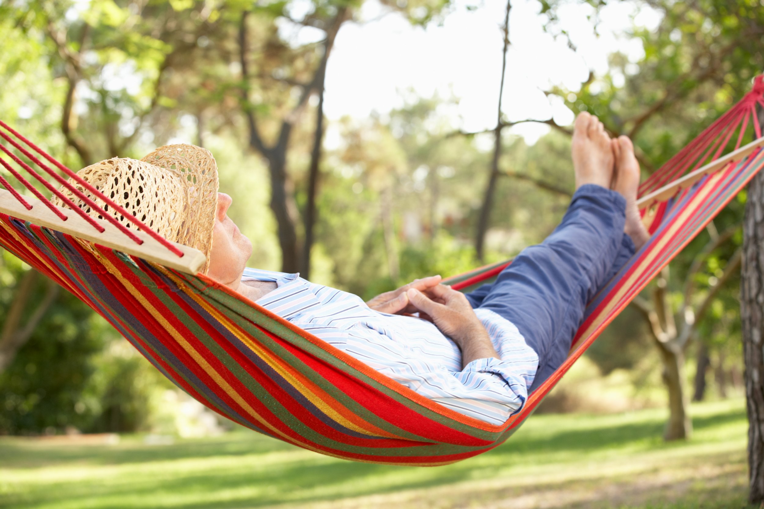 hammock man relax happy happiness content getty stock