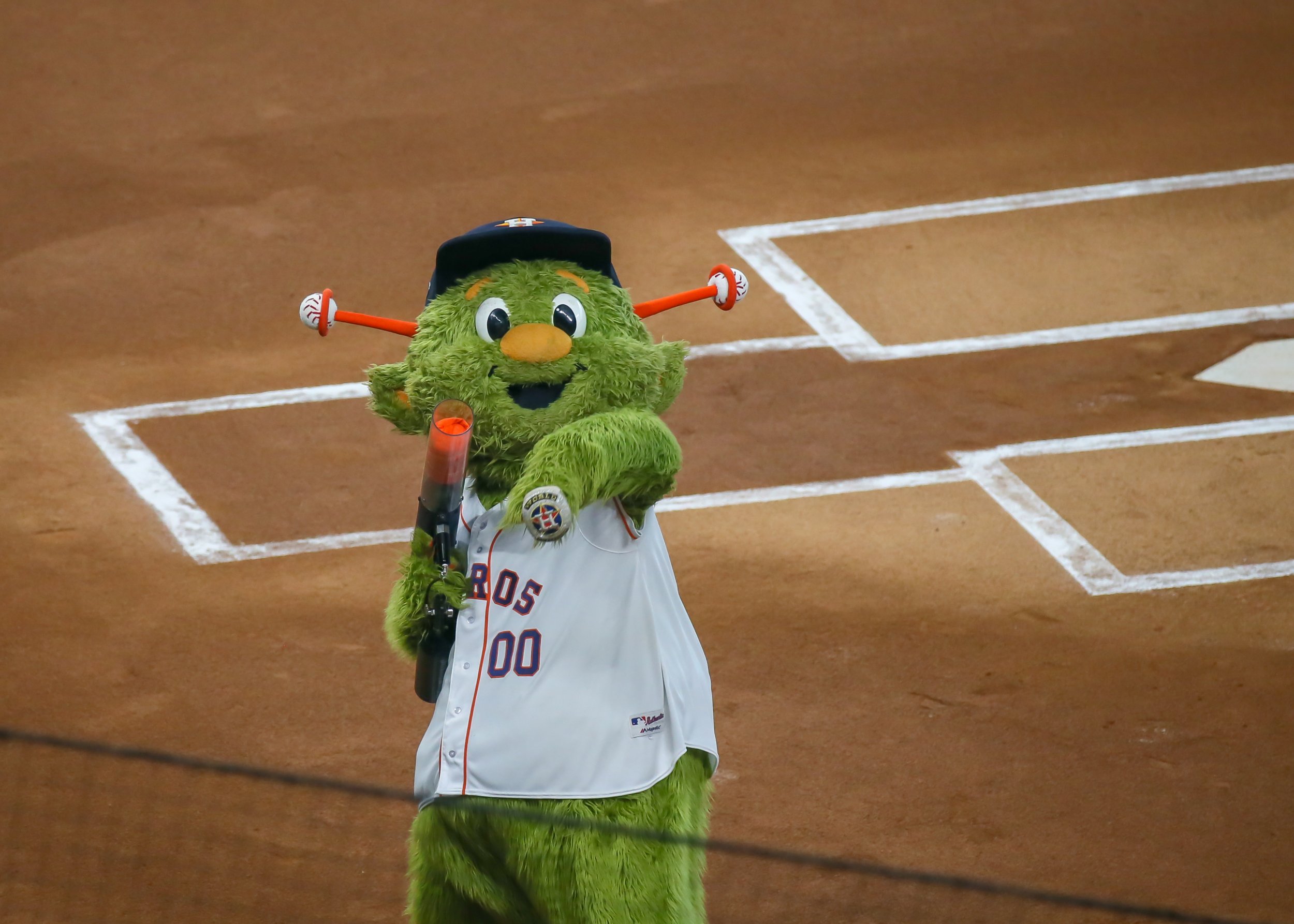 Houston Astros mascot Orbit and The Shooting Stars catapults t