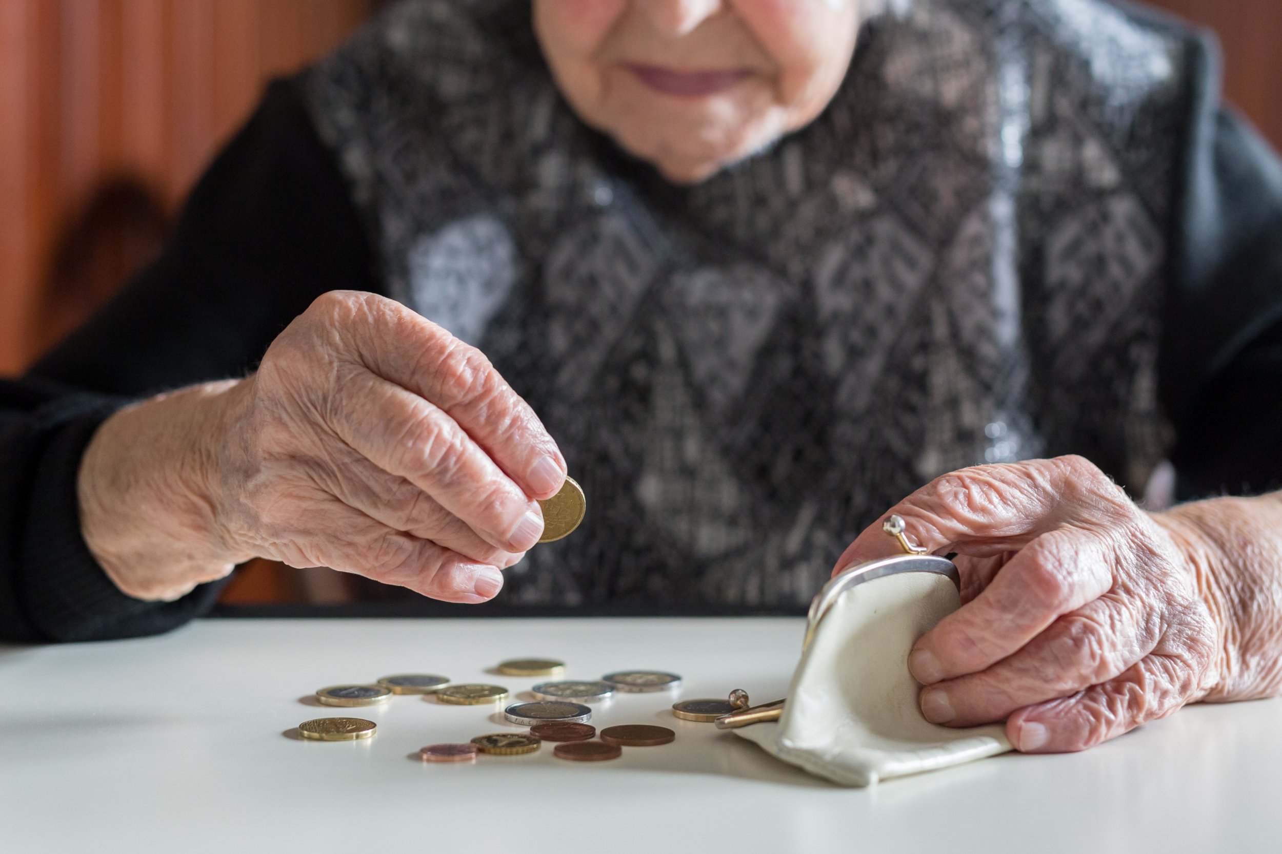 old woman elderly money stock getty