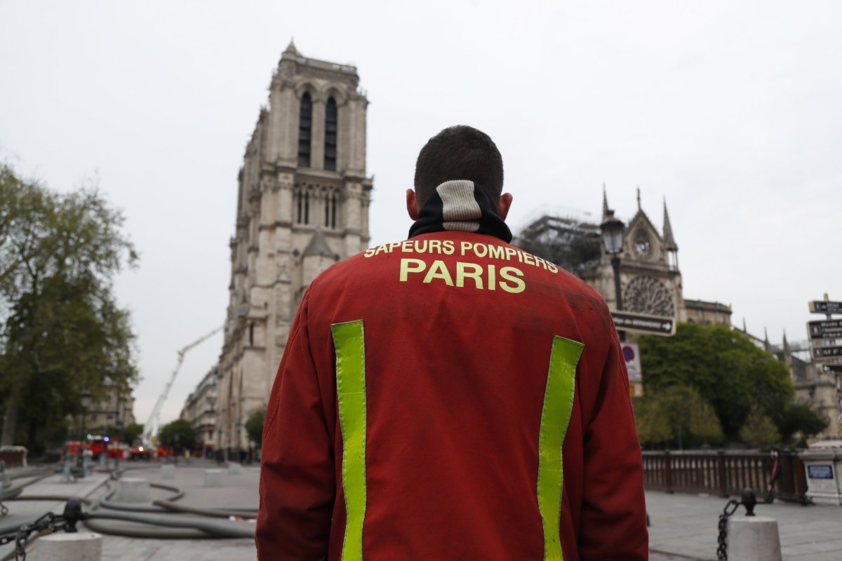 Notre Dame fire extinguished firefighters Paris