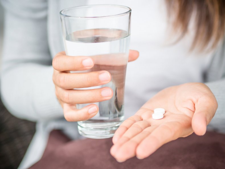 drug woman hand medicine getty stock