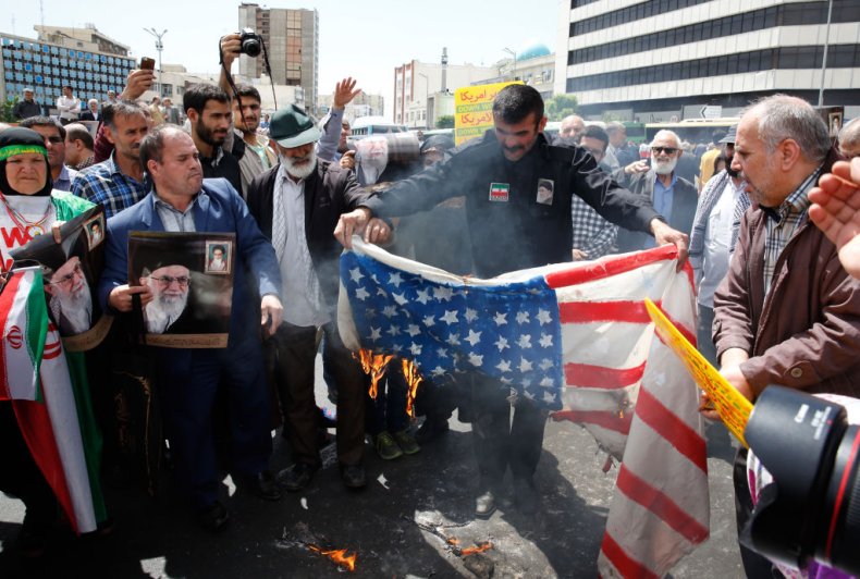 Iranian demonstrators burn U.S. flag