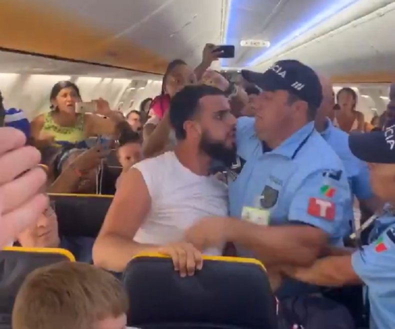 Ryanair flight viral video man attacked police