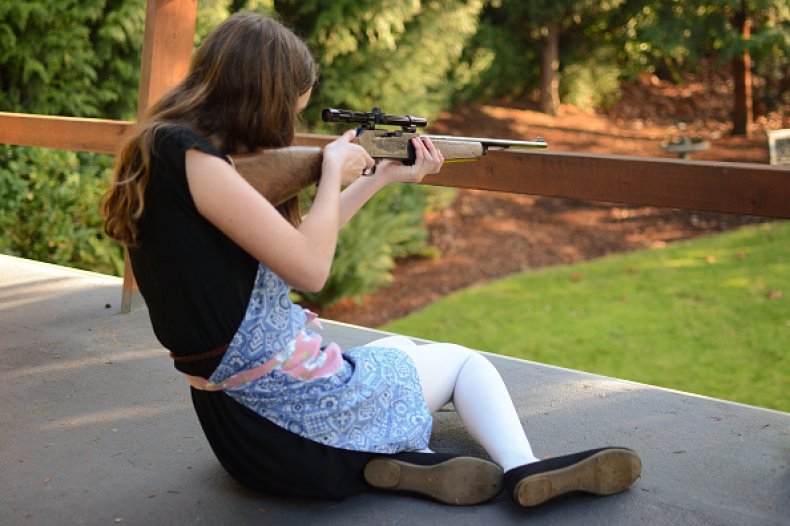 Girl Shooting Gun