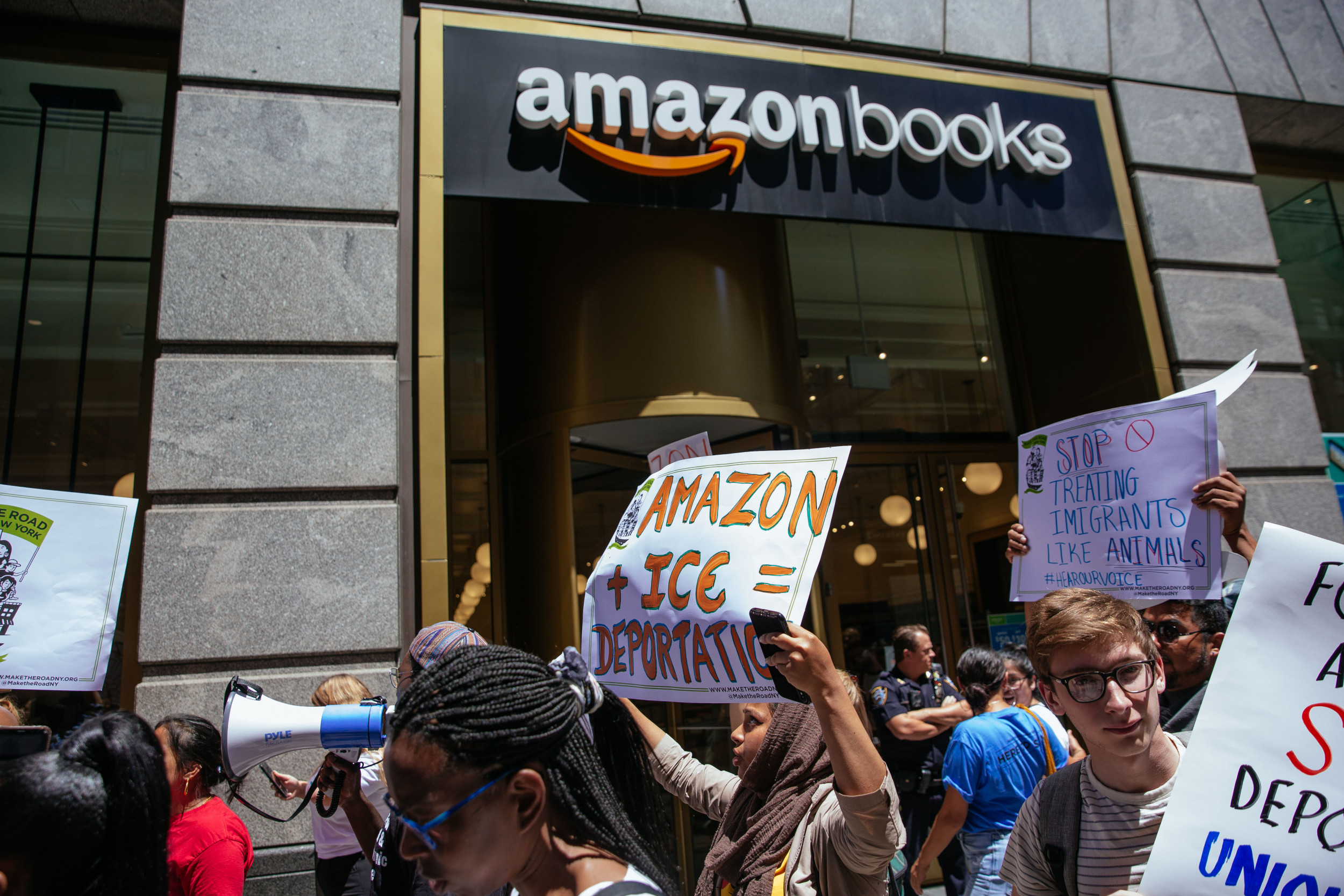 AntiICE Activists Are Marching on Jeff Bezos' Home to Protest Amazon's