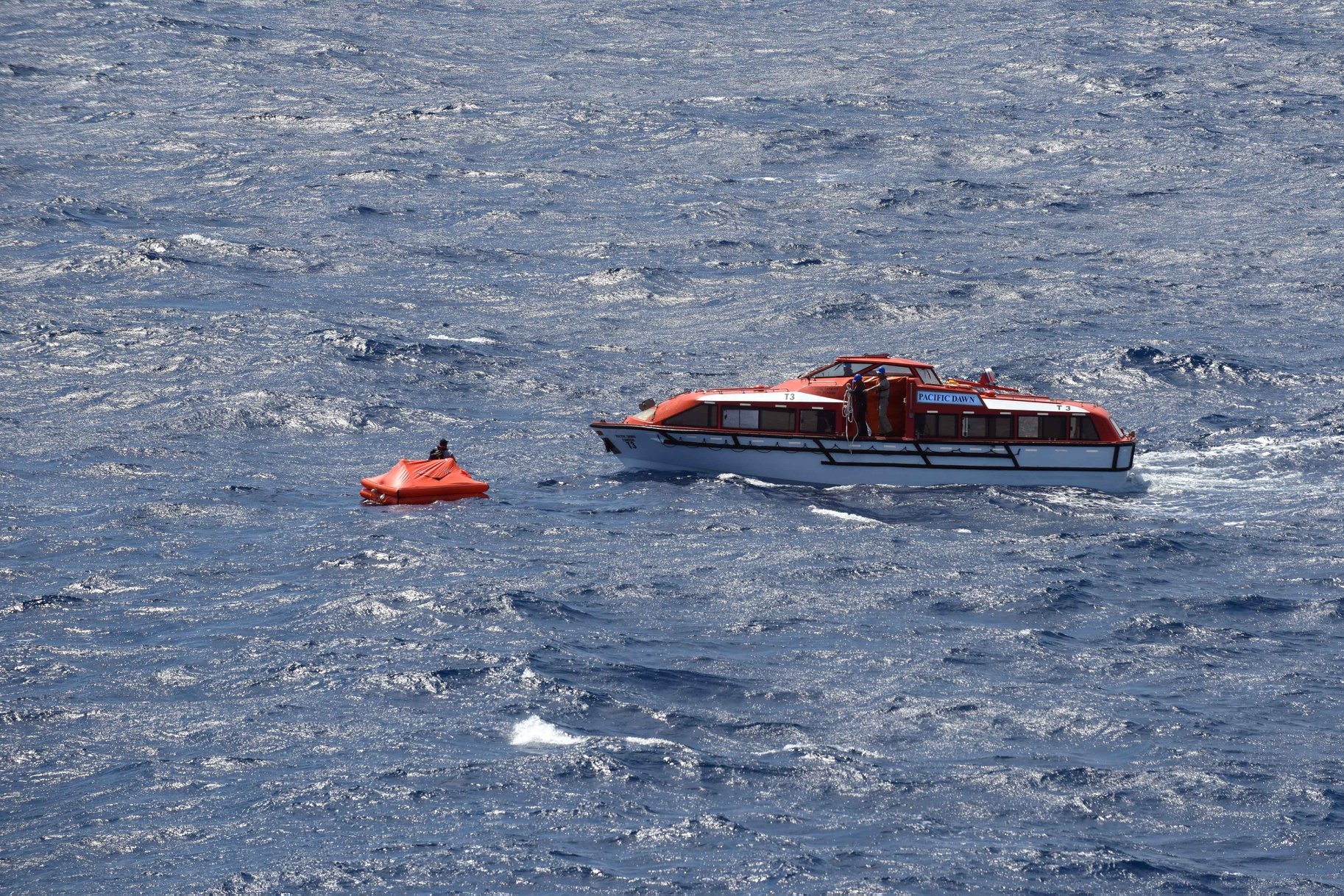 Cruise Ship Rescues 3 Men Stranded on Life Raft in the Middle of the Sea