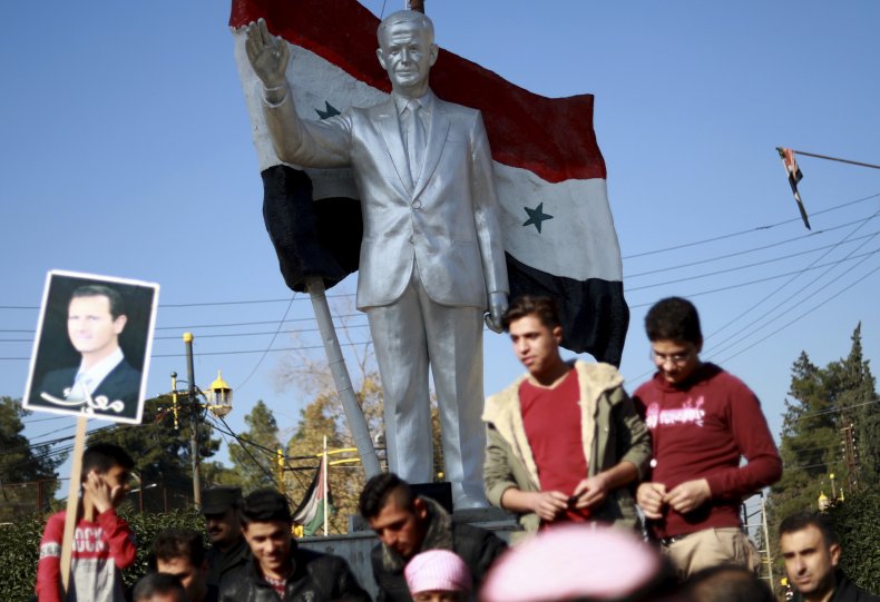 syria kurds assad flag portrait turkey