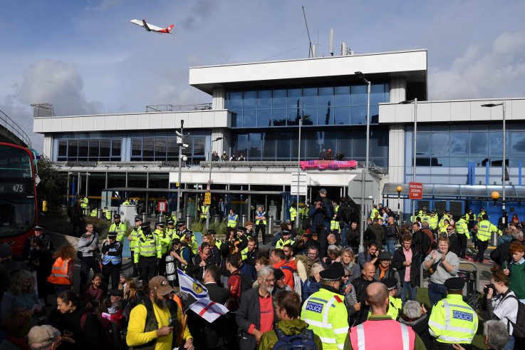 extinction rebellion Climate Change Protester Infiltrates Plane, Is Heckled By Passengers: 'You'll Be Thrown Off By Me'