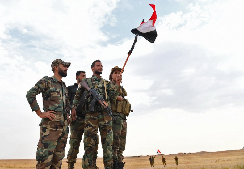 syria troops raqqa flag