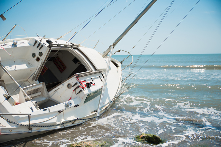 motor boat crashes into sailboat