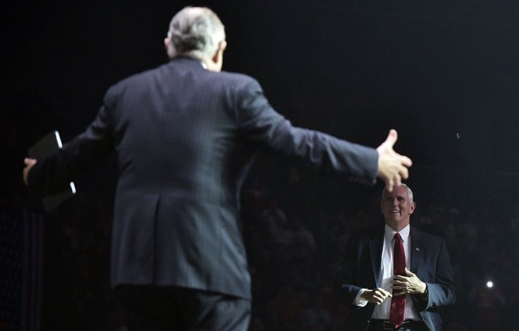 Giuliani runs toward Mike Pence Giuliani runs toward Mike Pence