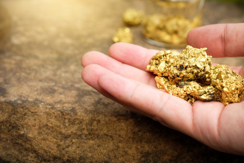 gold nugget in hand