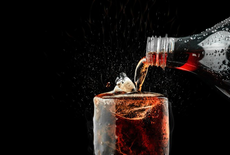 Soda being poured into a glass
