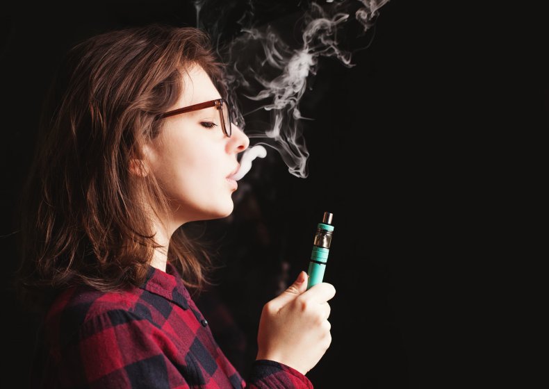 woman vaping, e-cigarette, smoking, stock, getty