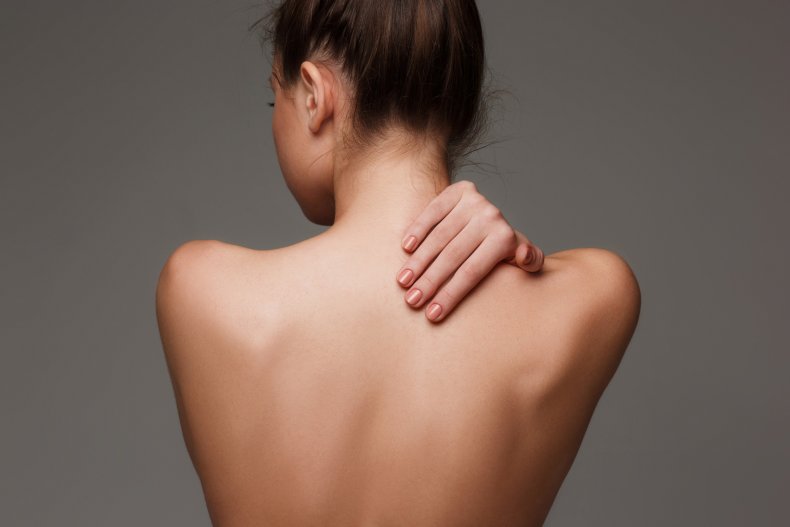 Woman Topless From Behind