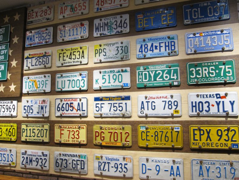 A wall of license plates