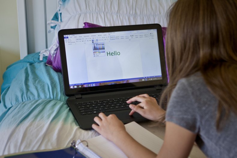 Woman typing computer screen