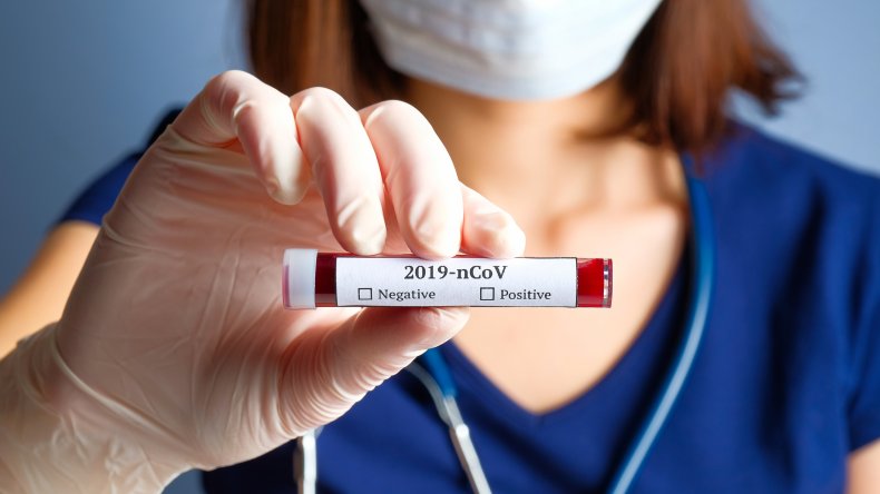 Nurse holding a Coronavirus blood test