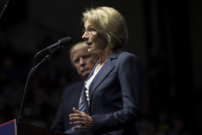 Betsy DeVos and Donald Trump