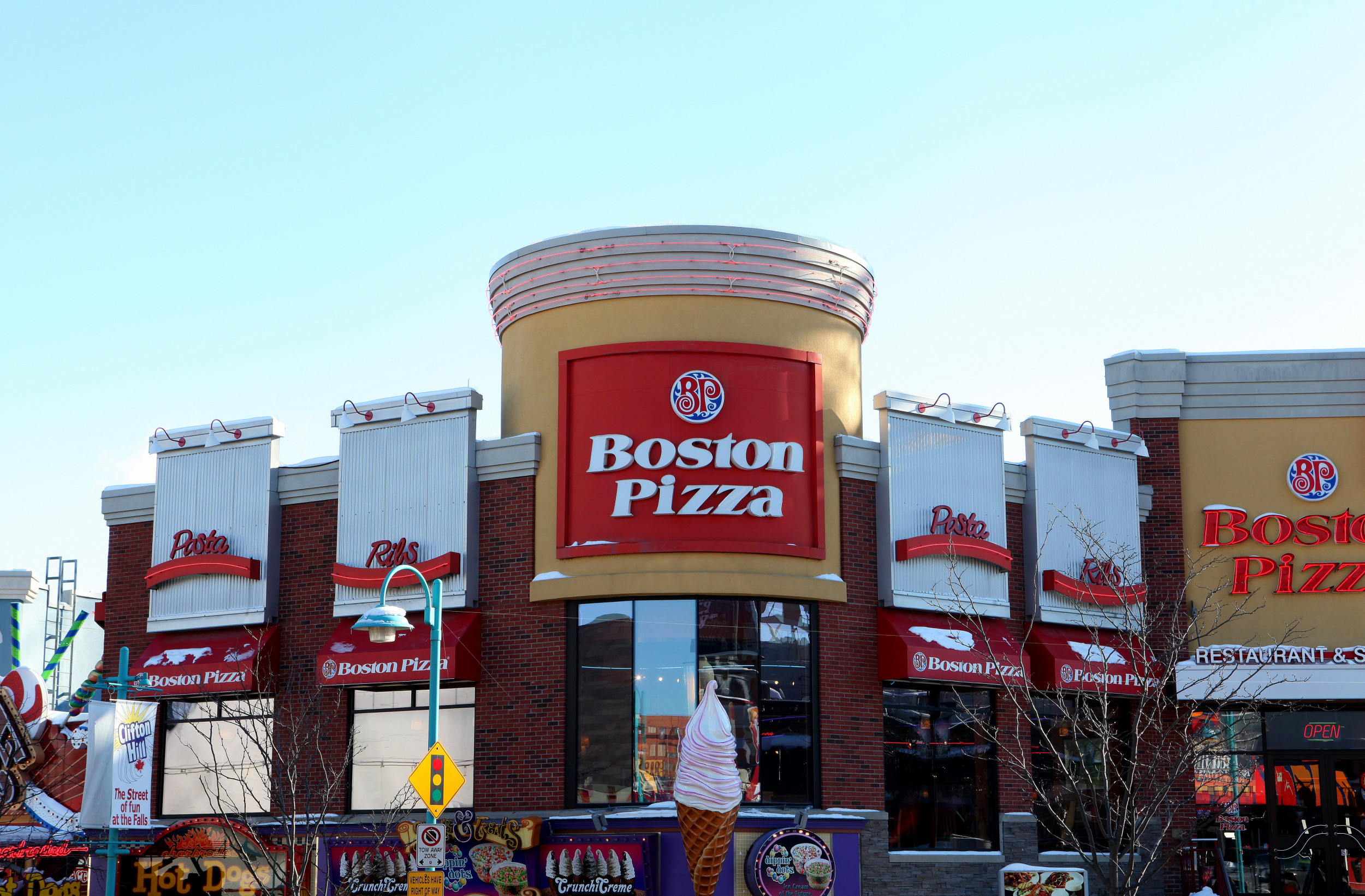Canada Man Arrested for Voyeurism After Hidden Camera Found in Bathroom at  Boston Pizza Restaurant