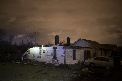 Storm damaged houses stand Storm damaged houses stand