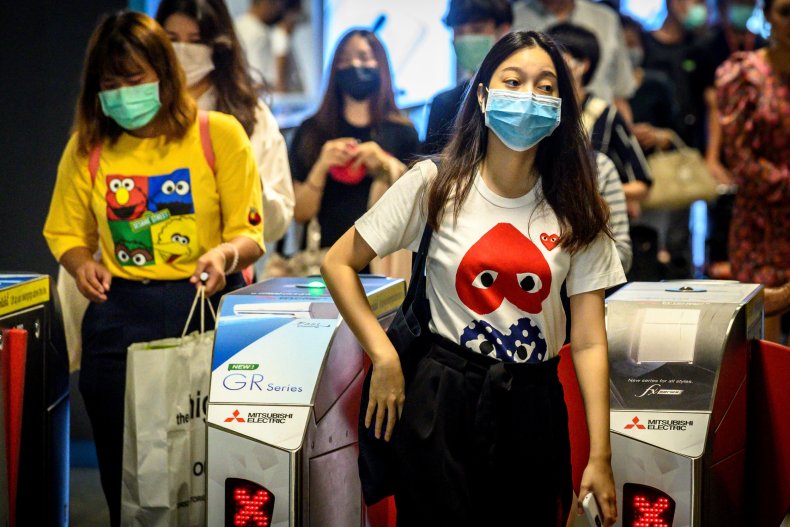 Commuters wearing facemasks