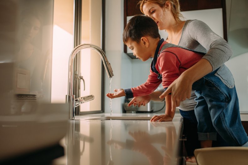 iStock Family Hand Washing iStock Family Hand Washing