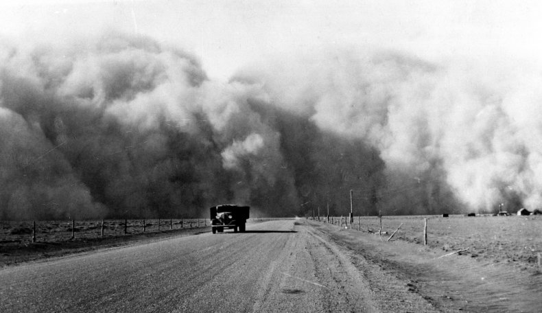 Large dust cloud appears behind a truck