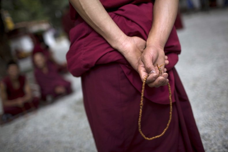 Tibetan Buddhist monk debates Buddhist related issues