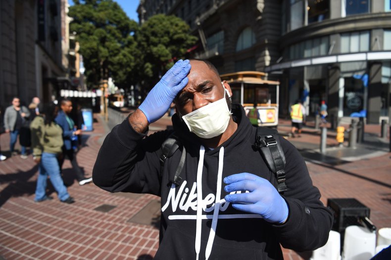 Pedestrian San Francisco wearing mask Feb 2020