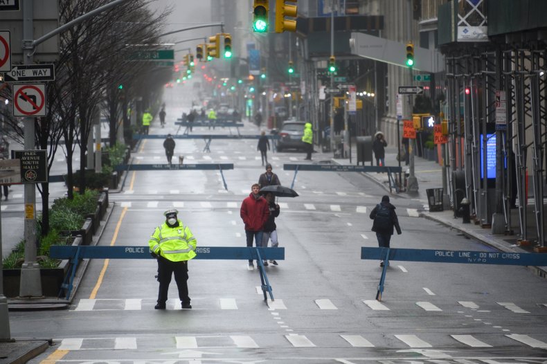 People walk down Park Avenue as part of NYC's "Open Streets"